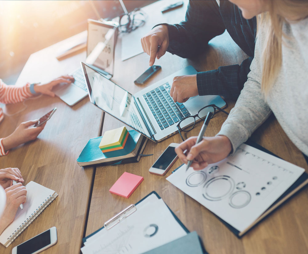 Outsourced B2B marketing team working hard